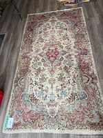 Full top view of rug showing overall design and condition
