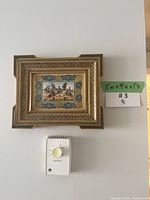 Full view of framed Persian miniature on wall