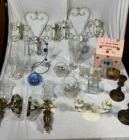 Group shot showing all items including wall sconces, glass pieces, brass-wood sconces and boxed potpourri pot