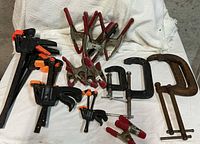 Assortment of clamps laid out together