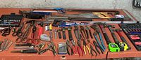 Overall view of tools laid out on bench