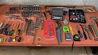 Overall view of all hand tools laid out on table