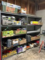 Both shelving units filled with boxes