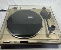 Top view of Pioneer PL-5 turntable with dust cover closed