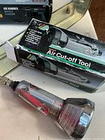 Boxed air cut-off tool and tool body visible