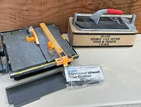 Electric tile saw, manual tile cutter, packaged diamond wheel cutter and loose strip