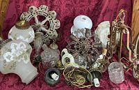 Group of chandelier parts, glass shades, prisms, rods