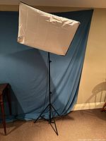 Softbox light mounted on tripod stand