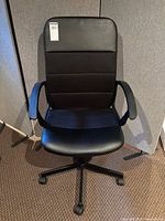 Front view of black IKEA Fingal office chair