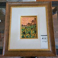 Front view of framed painting showing artwork, mat and frame