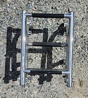 Closed view of stainless steel foldable boat ladder