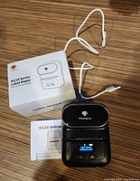 Label maker with cable, box and manual overview