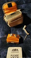 Sharpener body, crank handle, pouch, instructions