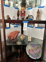 Full cabinet view showing variety of items across shelves