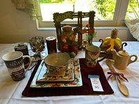 Overall view of all 13 items arranged on table