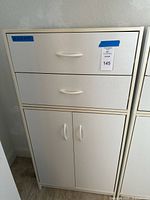 Front view showing full cabinet with drawers and doors