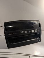 Front view of FoodSaver vacuum sealer closed