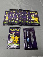 Front view of multiple sealed Trick or Trade booster packs