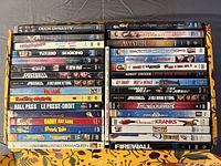 Two columns of DVD spines showing all 30 titles