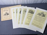 Envelope and six prints laid out