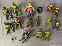 Wide view of all action figures arranged on table