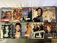 All ten magazines laid out in two rows; covers and wear visible