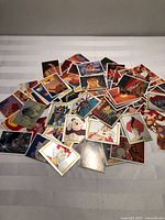 Pile of Thundercats sticker cards spread out on table