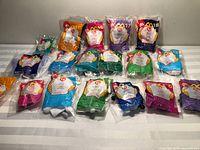 Group shot of all 18 sealed Ty Teenie Beanie Babies numbered 1-18