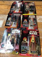 All six carded figures laid out