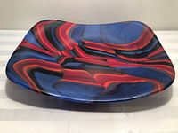 Top view of fused glass dish showing full swirl pattern