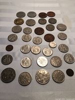 Full layout showing all coins, about 33 pieces