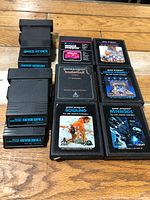 All 10 cartridges arranged showing titles