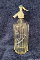 Full view of B. Shaw & Sons glass seltzer bottle with dispenser
