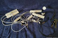 Overview of all three grow lights showing heads, goosenecks, clamps and clips