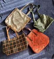 Four purses arranged together
