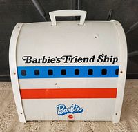 Exterior closed view showing branding and carry handle