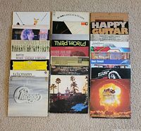 All 15 album covers displayed in three columns