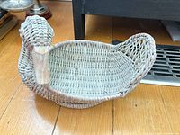 overall view of gray wicker duck basket