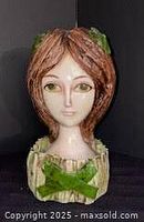 Front view of Hong Horizons papier-mâché bust lipstick holder