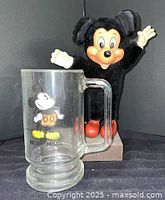 Mug and plush figure front view