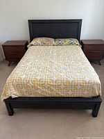 Full view of assembled double bed showing frame, headboard, box spring and mattress