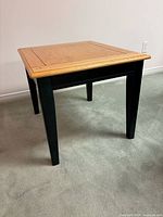 End table showing top, legs, overall design