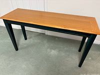 Full view of rectangular console table showing top, legs, and overall condition