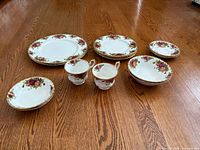 All 14 Old Country Roses pieces arranged on floor