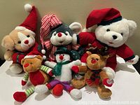 Front view of all six plush toys