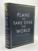 Front cover showing title and spine design of faux-book storage box