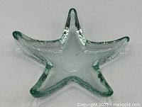 Top view of light green recycled glass starfish dish showing overall shape and texture