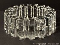 Top angled view showing full ribbed circular ashtray