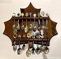 Front view of wooden rack holding all 18 pieces