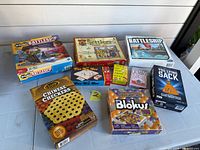Front view of all game boxes on table